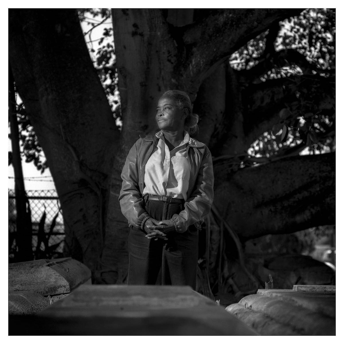 Former Lincoln Memorial Park owner Elyn Johnson was photographed inside the cemetery for the book entitled "Miami In Our Own Words," celebrating Miami's centennial. <i>Photo by C.W. Griffin / Iris PhotoCollective</i>